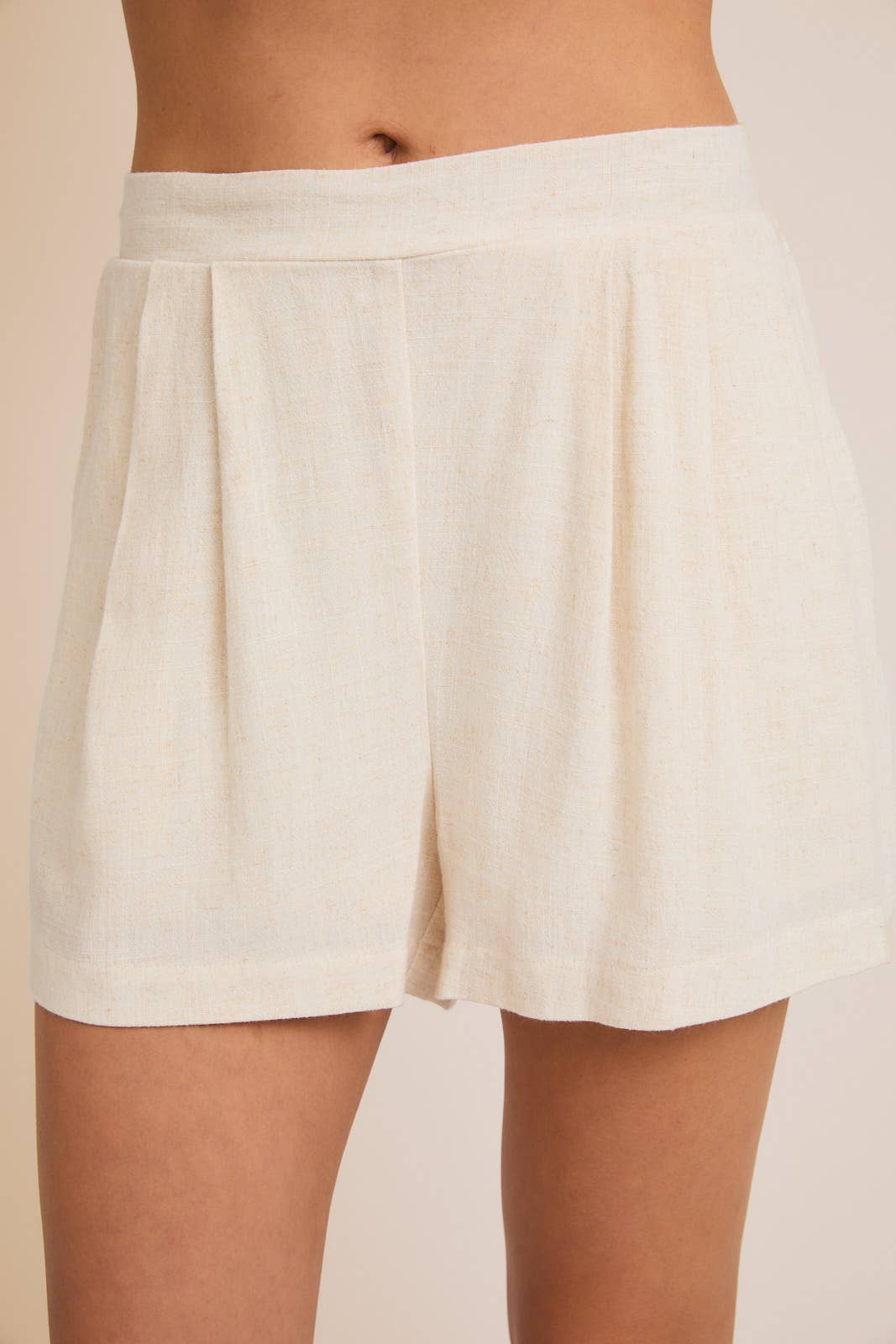 BUTTON UP VEST TOP AND PLEATED DETAIL SHORTS