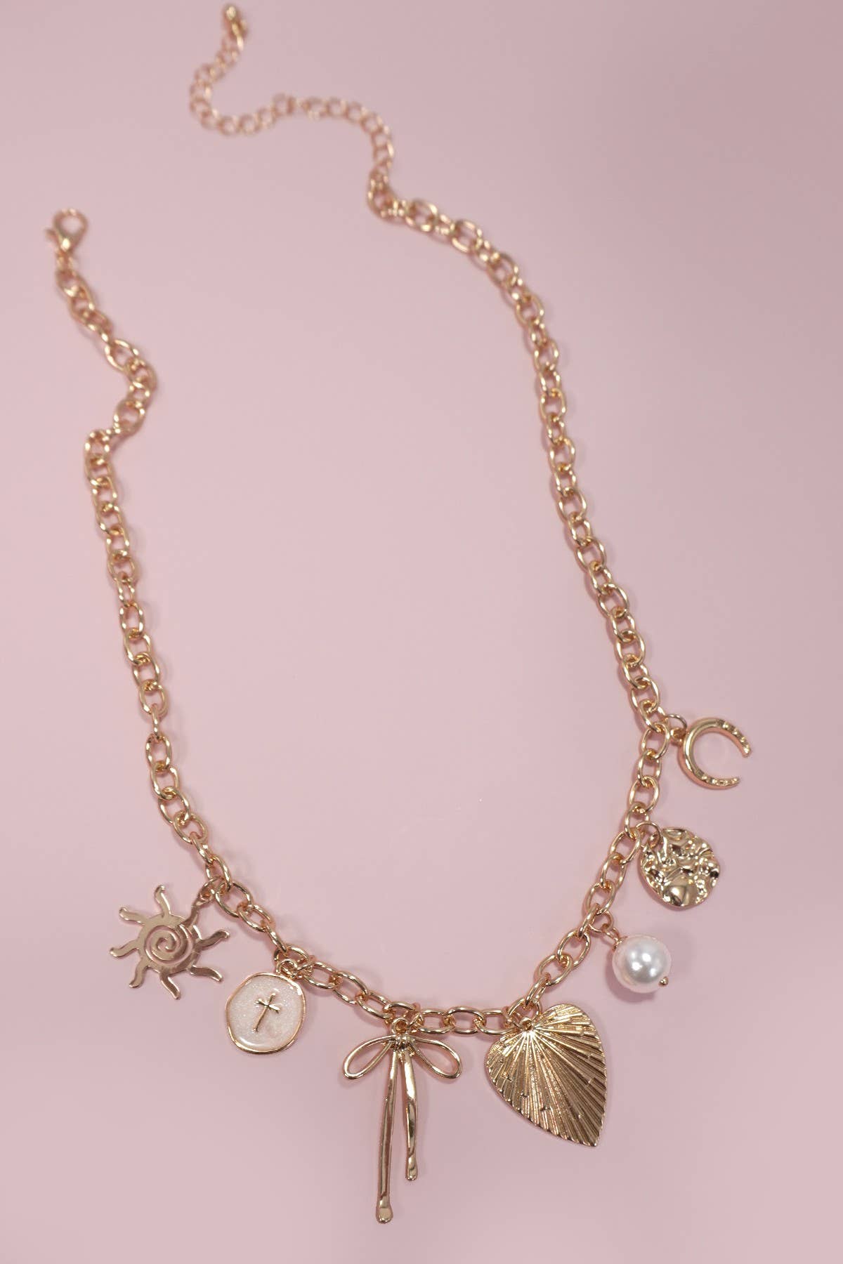 SUN BOW PEARL CROSS DISC U CHARM NECKLACE | 80N1182